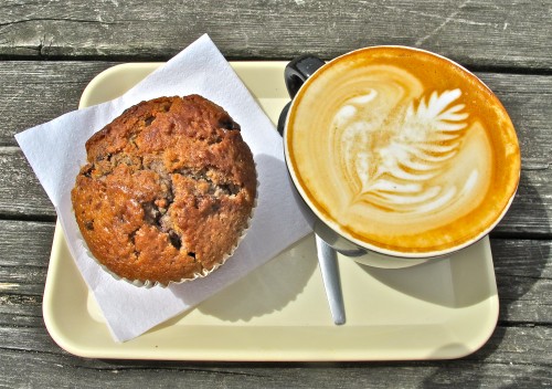 A delicious combo of home made muffin and a flat white at Trakteren, Amsterdam