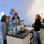 Customers chatting to Anja about what coffees they should order