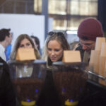 Visitors taking a look at some of the beautiful coffees on show