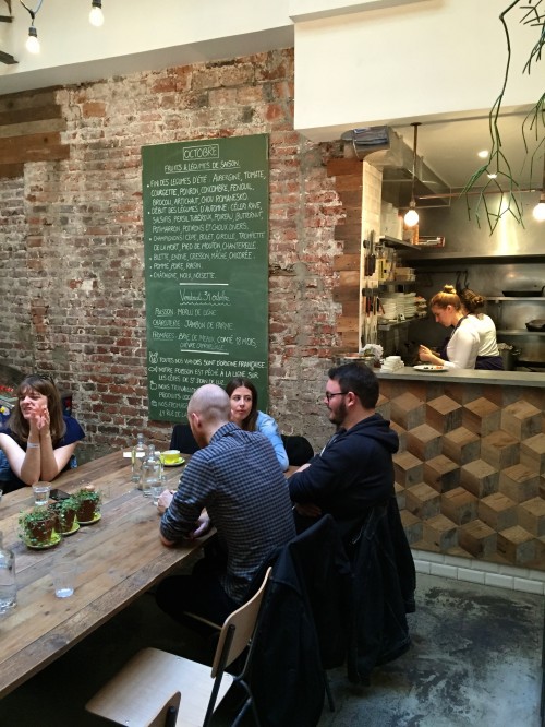 Large communal table with view of the open kitchen