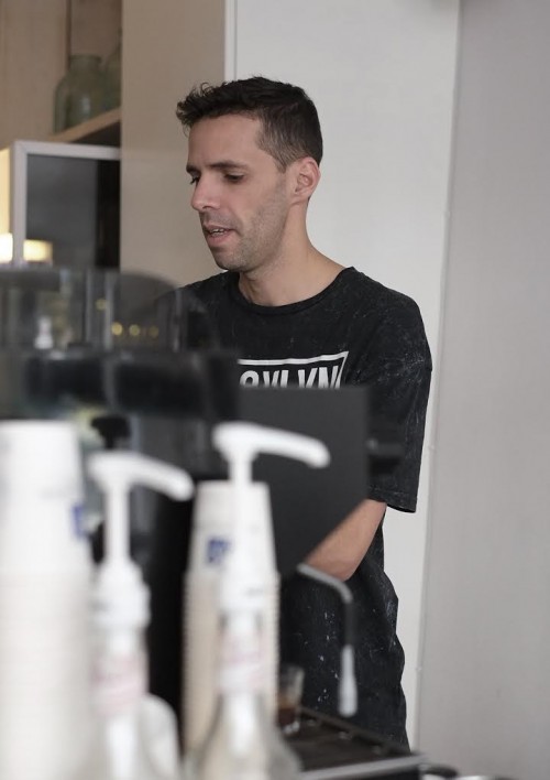 Nir behind his Espresso machine