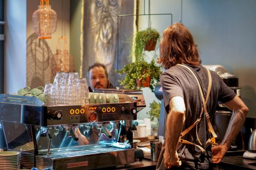 Barista with customer