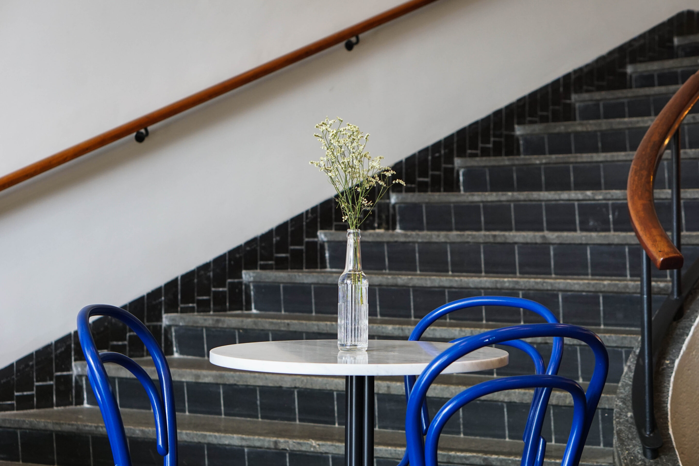 Bistro style furniture with grand theatre style backdrop