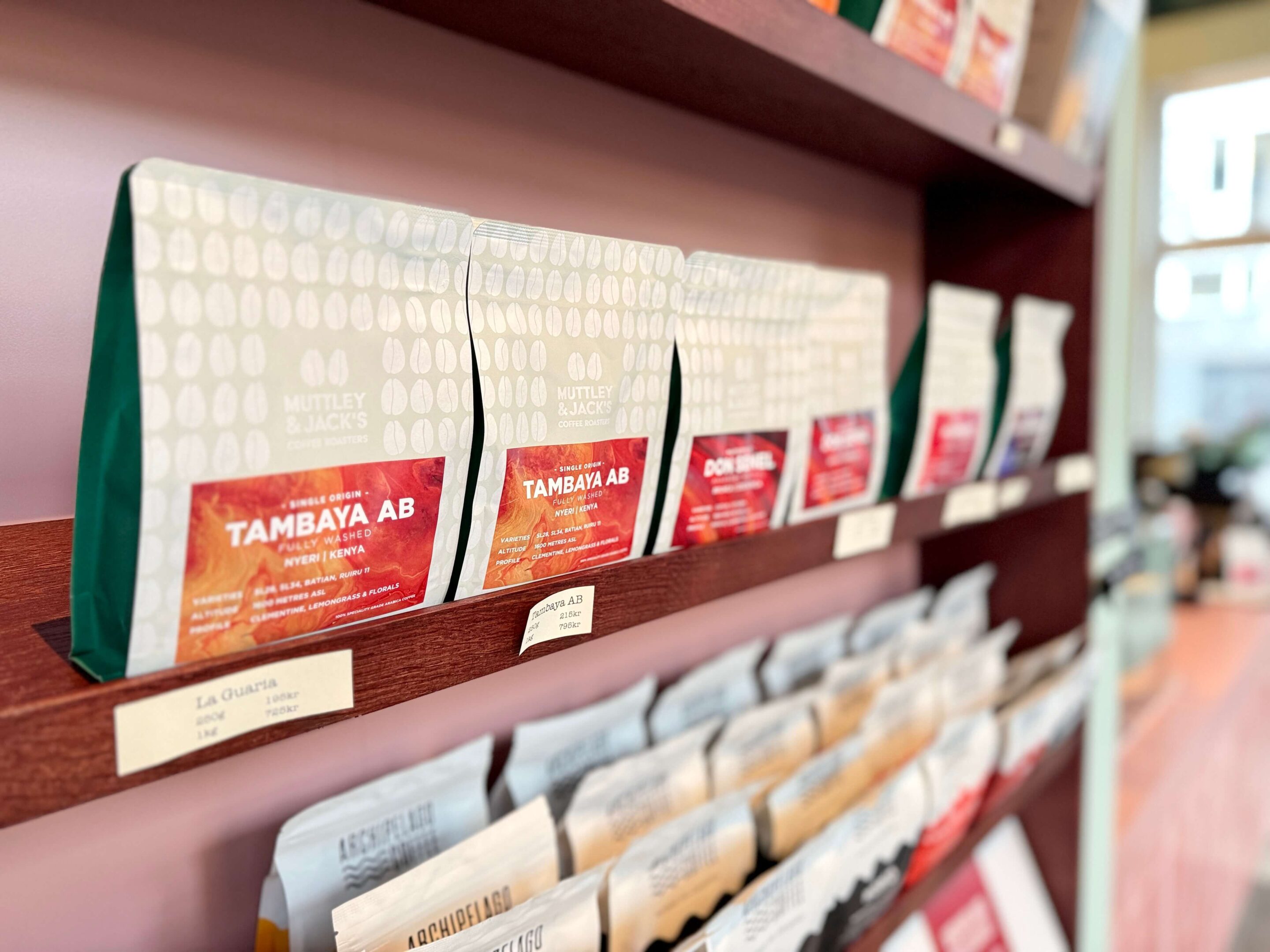 A row displaying various coffee bags