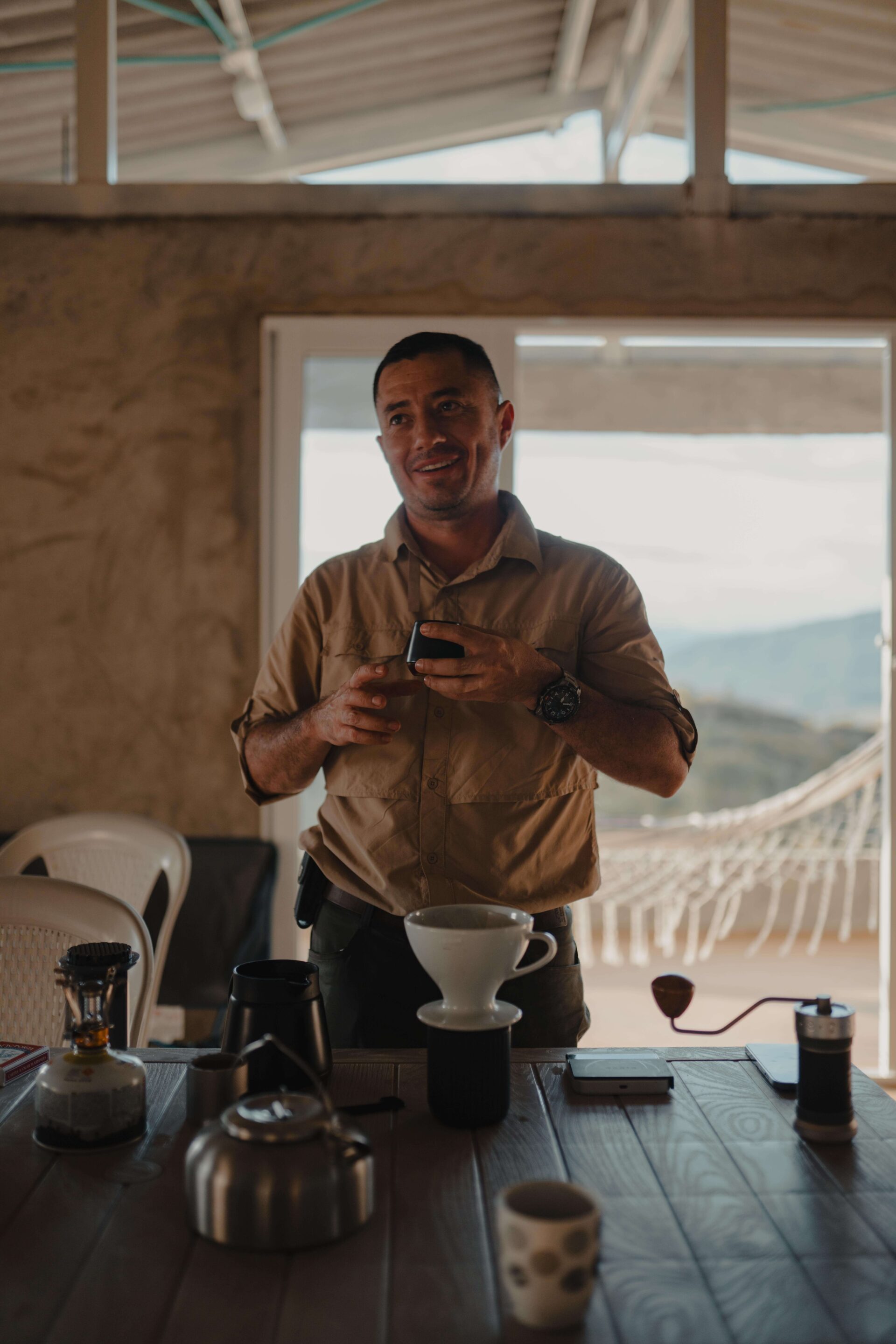 Man standing in front of a cupping table