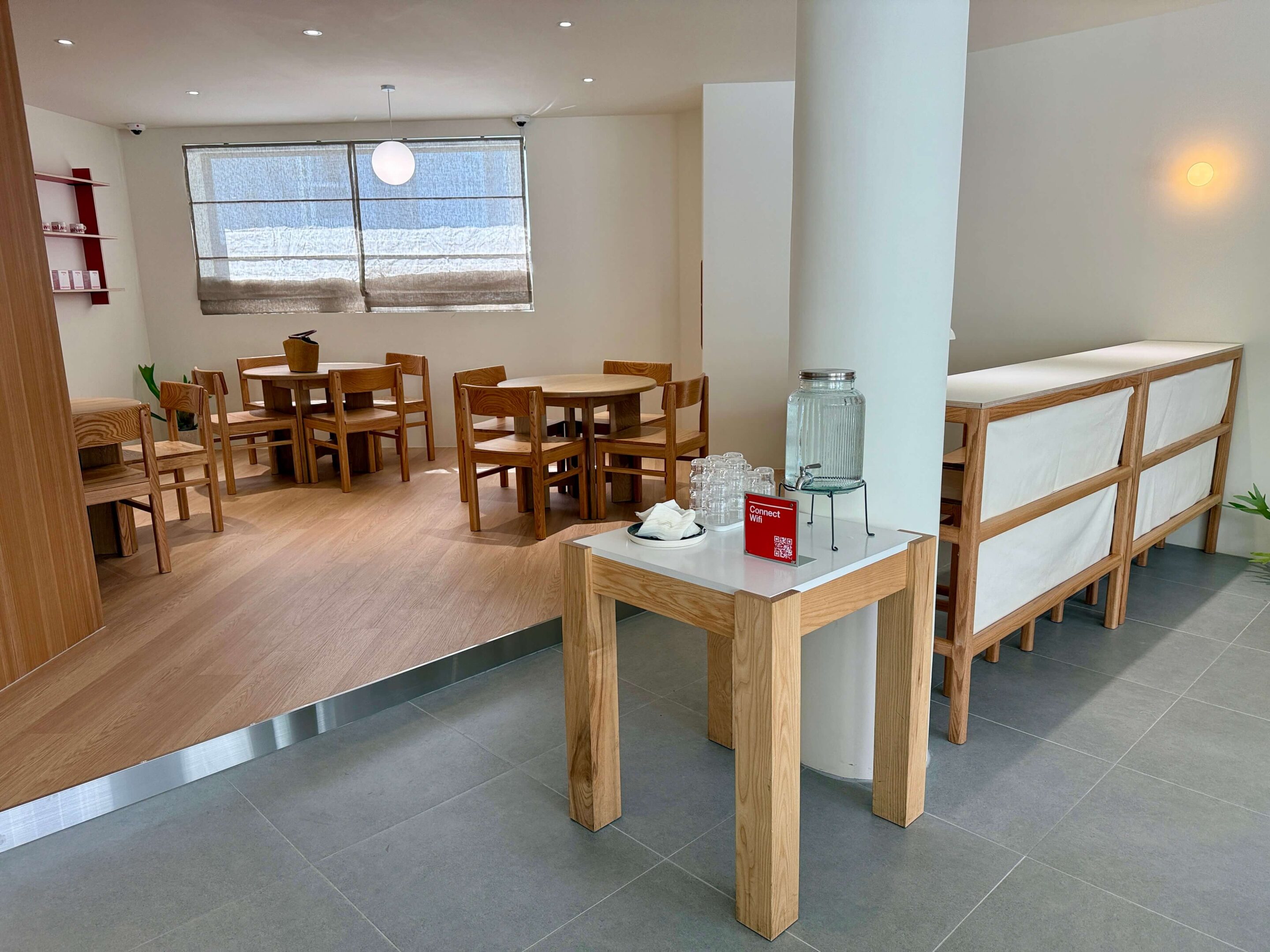 View of a café space with various tables